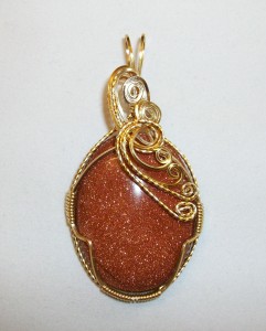 Judy Ellis's Gem Profile- Goldstone - , General Education, , Gold Plated wire Goldstone pendant