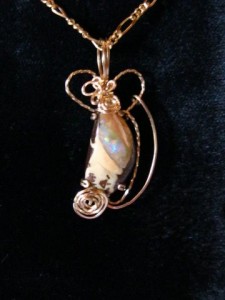 Dale Armstrong's Gem Profile- Boulder Opal - , General Education, , Boulder opal pendant in 24-gauge gold filled wire.