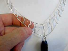 Tracey McKenzie's Lightning Storm - , Contemporary Wire Jewelry, Wire Wrapping, Wrapping, Wire Wrapping Jewelry, Adding zig zags to the finished piece.