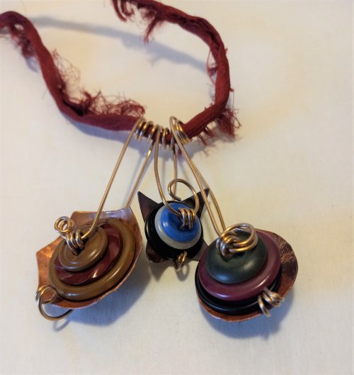 Judy Freyer Thompson's Stacked Button Charms - , Contemporary Wire Jewelry, Cutting, Cutting Tool, Cutters, Dapping, Dapping Jewelry, How To Punch Holes, Hole Punching, Punch A Hole, Loops, Wire Loop, Wrapped Wire Loop, Sawing, Saw, Wire Saw, Butane Torch, Soldering, Solder, stacked button charms