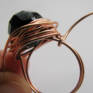 Albina Manning's Quick Wired Bead Ring - , Contemporary Wire Jewelry, Wire Wrapping, Wrapping, Wire Wrapping Jewelry, Tucking each wire in with chain nose pliers.