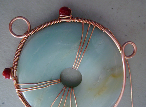 Mary Bailey's Spirit Pendant - , Contemporary Wire Jewelry, Coiling, Coiling Wire, Wire Coiling, Weaving, Wire Weaving, Weaving Wire, 26-gauge adding 12 more coils to the frame.