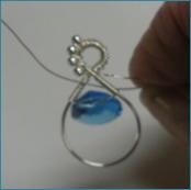 Judy Larson's Beaded Briolette Pendant - , Wire Weaving, Wire Wrapping, Wrapping, Wire Wrapping Jewelry, Weaving, Wire Weaving, Weaving Wire, Continued wrapping on the frame.