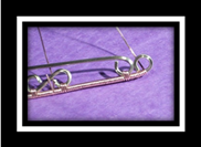 Cynthia Wyatt's Beginners Infinity Bracelet - , Contemporary Wire Jewelry, Coiling, Coiling Wire, Wire Coiling, Lashing, Wire Lashing, Wire Wrapping, Wrapping, Wire Wrapping Jewelry, Finish wrapping the 21 gaige half round wire.