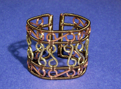 Cynthia Wyatt's Infinity Cuff - , Contemporary Wire Jewelry, Coiling, Coiling Wire, Wire Coiling, Lashing, Wire Lashing, Wire Wrapping, Wrapping, Wire Wrapping Jewelry, Shaping the cuff.