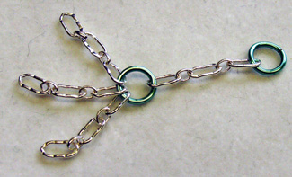 Dale Armstrong's Chained Fluorite Pendulum - , Contemporary Wire Jewelry, Wire Wrapping, Wrapping, Wire Wrapping Jewelry, Adding jump rings to each chain.