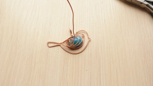 Oksana Truhan's Wire Bird Pendant with Cabochon - , Contemporary Wire Jewelry, Filing, Finishing, Lashing, Wire Lashing, Spirals, Wire Spiral, Spiral Wire Wrap, Weaving, Wire Weaving, Weaving Wire, Butane Torch, Soldering, Solder, bend the wire into wing shapes