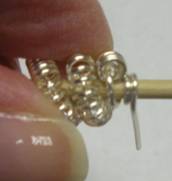 Judy Larson's How to Make a Wire Coil and Bead - , Findings & Components, Toggles & Clasps, Earwire & Headpin, Coiling, Coiling Wire, Wire Coiling, Findings, Clasps, Components, Wire Wrapping, Wrapping, Wire Wrapping Jewelry, Finished end of coil