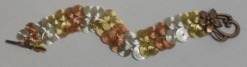 Judy Larson's Egyptian Coil Bracelet - , Contemporary Wire Jewelry, Coiling, Coiling Wire, Wire Coiling, Loops, Wire Loop, Wrapped Wire Loop, Spirals, Wire Spiral, Spiral Wire Wrap, Wire Wrapping, Wrapping, Wire Wrapping Jewelry, Egyptian Wire coil bracelet