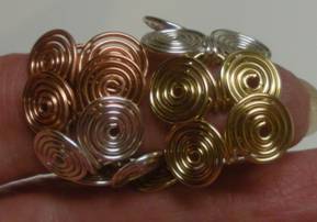 Judy Larson's Egyptian Coil Bracelet - , Contemporary Wire Jewelry, Coiling, Coiling Wire, Wire Coiling, Loops, Wire Loop, Wrapped Wire Loop, Spirals, Wire Spiral, Spiral Wire Wrap, Wire Wrapping, Wrapping, Wire Wrapping Jewelry, Flexible Egyptian chain