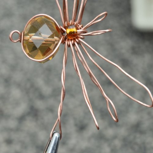 copper wire wrapped cabochon spider with beaten wire legs spooky