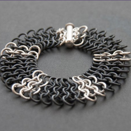 Kylie Jones's Black Niobium and Sterling Chain Maille Bracelet, Chain Maille Jewelry. Making Chain, Chain Making . Black niobium and sterling silver chain maille flat cuff bracelet.