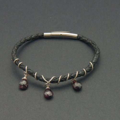 Kylie Jones's Silver Vine Wrapped Bracelet, Contemporary Wire Jewelry. Lashing, Wire Lashing, Loops, Wire Loop, Wrapped Wire Loop, Wire Wrapping, Wrapping, Wire Wrapping Jewelry, . Woodland style vine bracelet with wire wrapped garnets.