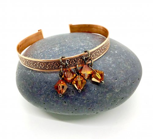 Kristal Wick's Kansas Tornado Daisy Chain Bangle, Contemporary Wire Jewelry. How To Punch Holes, Hole Punching, Punch A Hole, Oxidizing Wire, Oxidizing, Antiquing Wire, Antiquing. <br />
This bangle was quick and fun to make.