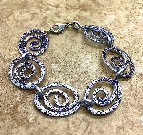 Kristal Wick's Misty Mountains Spiral WIre Bracelet, Contemporary Wire Jewelry. Spirals, Wire Spiral, Spiral Wire Wrap, Oxidizing Wire, Oxidizing, Antiquing Wire, Antiquing, Texturing. Recently, I've had many customers request more lighter weight jewelry so I wanted to give aluminum wire a try.