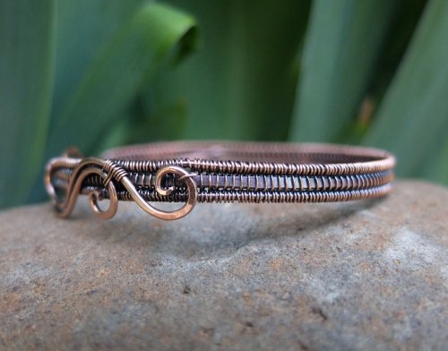 Elizabeth Schultz's Olympia Woven Wire Bracelet Cuff, Wire Weaving. Weaving, Wire Weaving, Weaving Wire. Learn how to use the Figure-8 weave to create this simple, yet elegant, cuff bracelet as well as how to add dimension to your swirls.