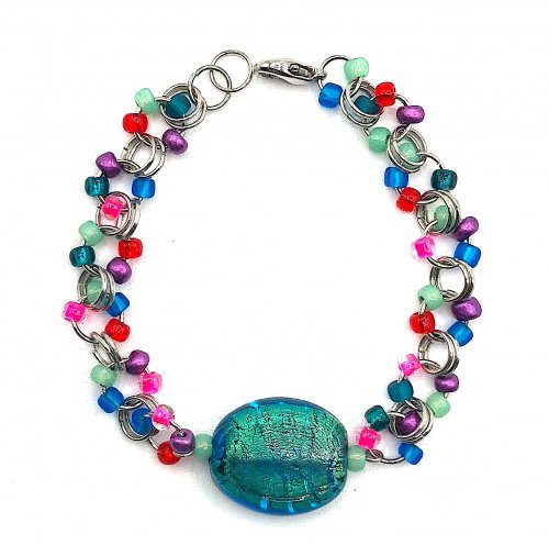 Kristal Wick's Dog Dayz of Summer Chain Bracelet, Contemporary Wire Jewelry. Making Chain, Chain Making . Use up your seed bead stash and make a multi-colored rainbow bracelet or simplify with a monochromatic look.