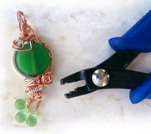 Rhonda Chase's Getting Rid of the Tail - , Classic Wire Jewelry, Wire Wrapping, Wrapping, Wire Wrapping Jewelry, Crimping pliers used to finish copper wire pendant