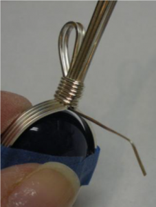 Judy Larson's Two Tips for Making Pendant Bails with Craft Wire - , Classic Wire Jewelry, Wire Wrapping, Wrapping, Wire Wrapping Jewelry, Design, Pulling end of craft wire tail tight