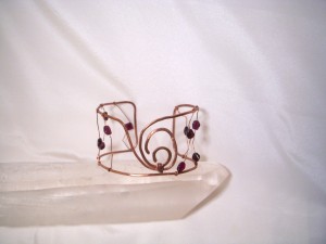 Garnet Cuff in Copper wire by Terri McMahon