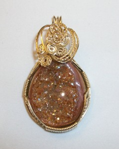 Carmel-brown druzy pendant wrapped by Joan Madouse