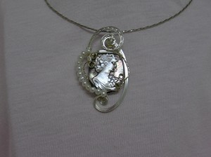 Wire wrapped cameo pendant by Irisha Patterson