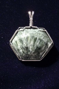 Seraphinite cabochon by Darryl Heiden; wire wrapped in sterling silver by Delores Heiden