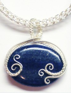 Judy Larson used 2 gauges of wire and a 30x40 Lapis bead to make this pendant.